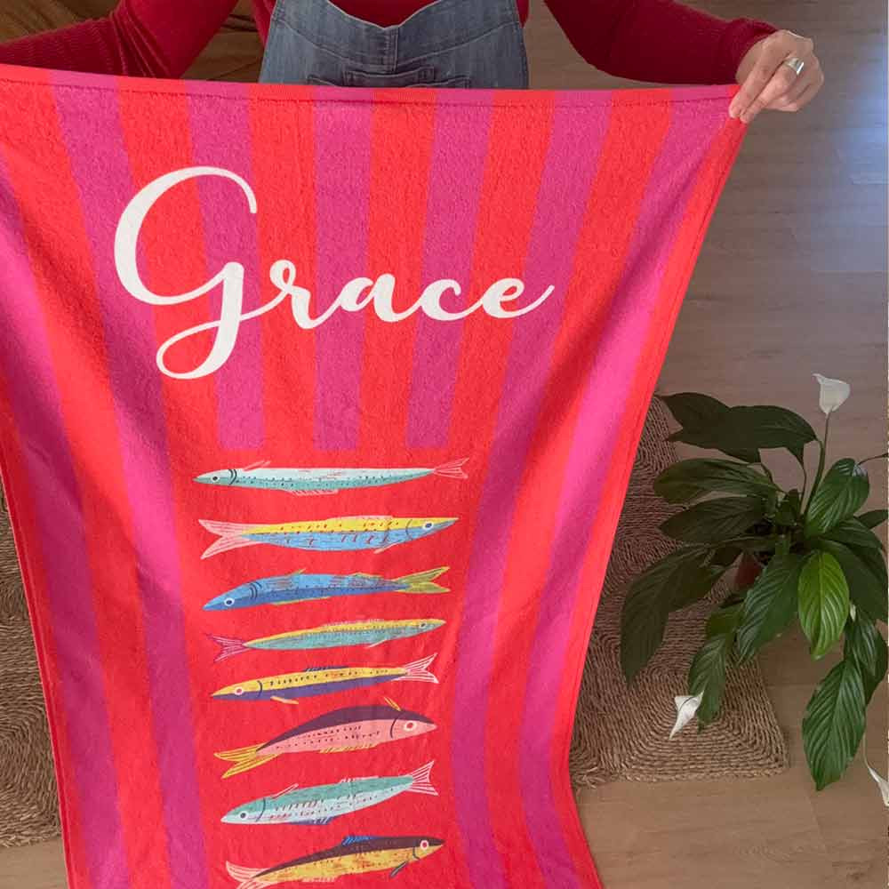 toalla rayas rojas y fucsia