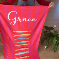toalla rayas rojas y fucsia